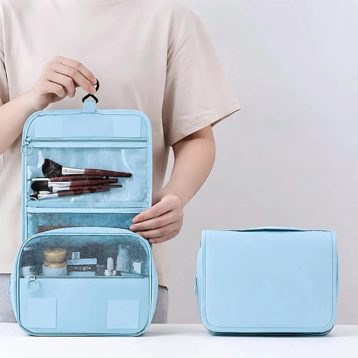 Bolsa de aseo para viaje con gancho de colgar