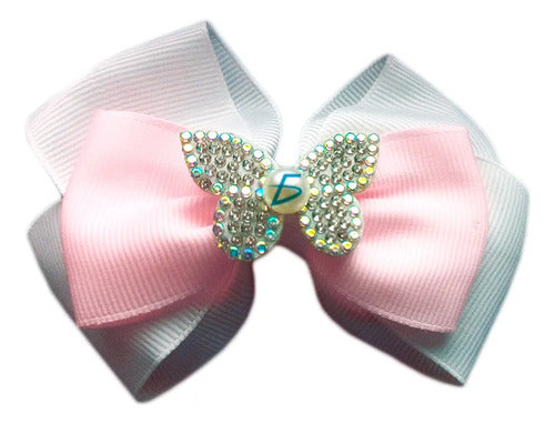 Par de moños estilo coquete con broche decorado
