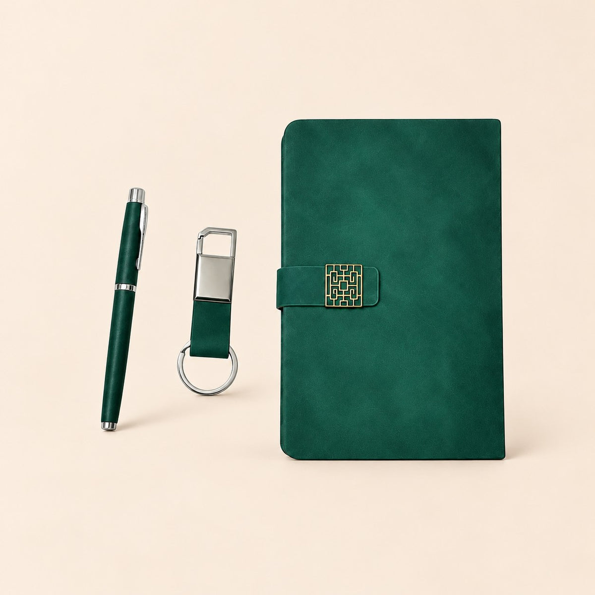 Set de regalo verde esmeralda con libreta, pluma y llavero