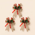 Paquete de 3 moños de Navidad con mini bouquet de garapiña