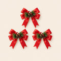 Paquete de 3 moños de Navidad con mini bouquet de garapiña